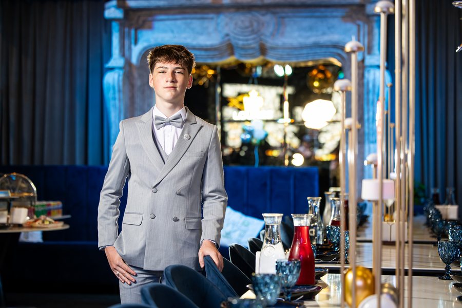 Levi in a gray suit on his Bar Mitzvah day